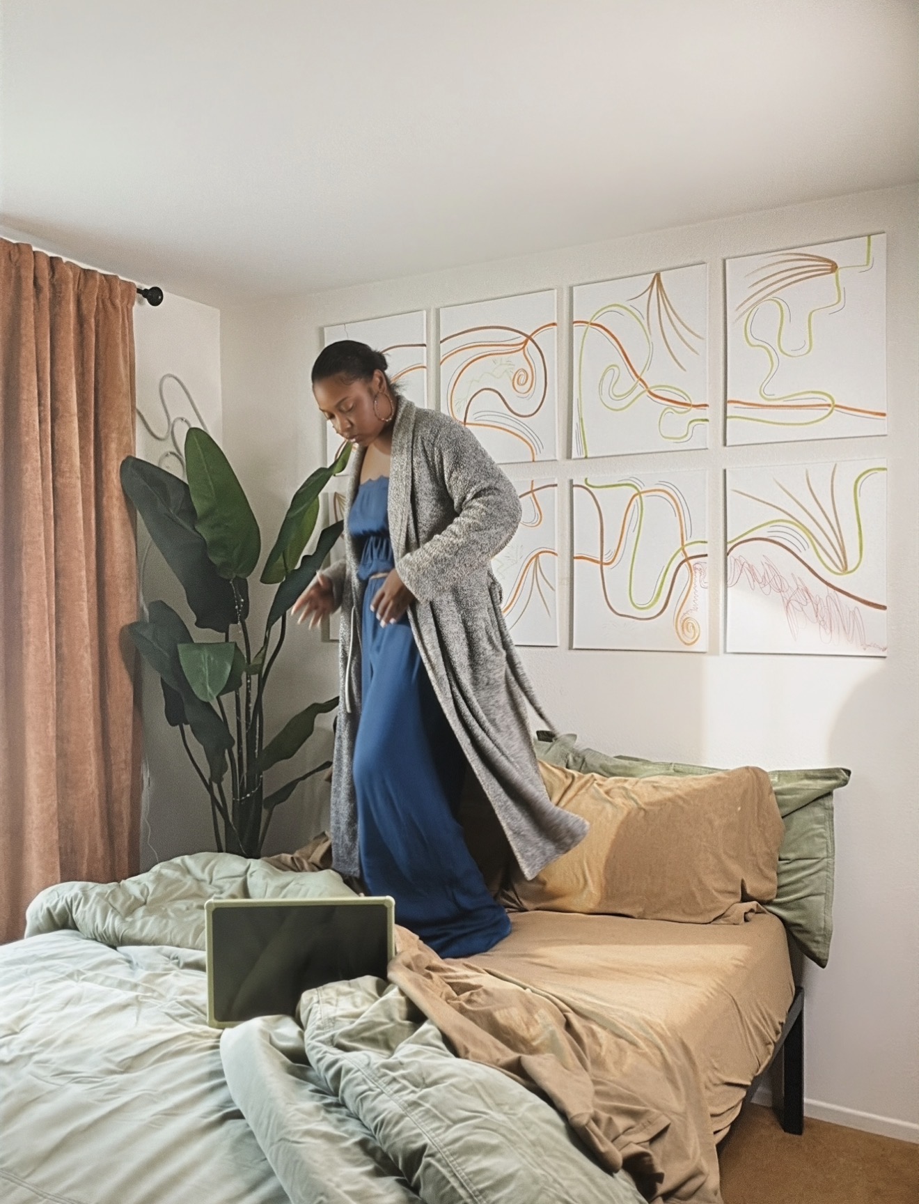 earth tone bedroom, sage green comforter, terracotta curtains, LA bedroom edit