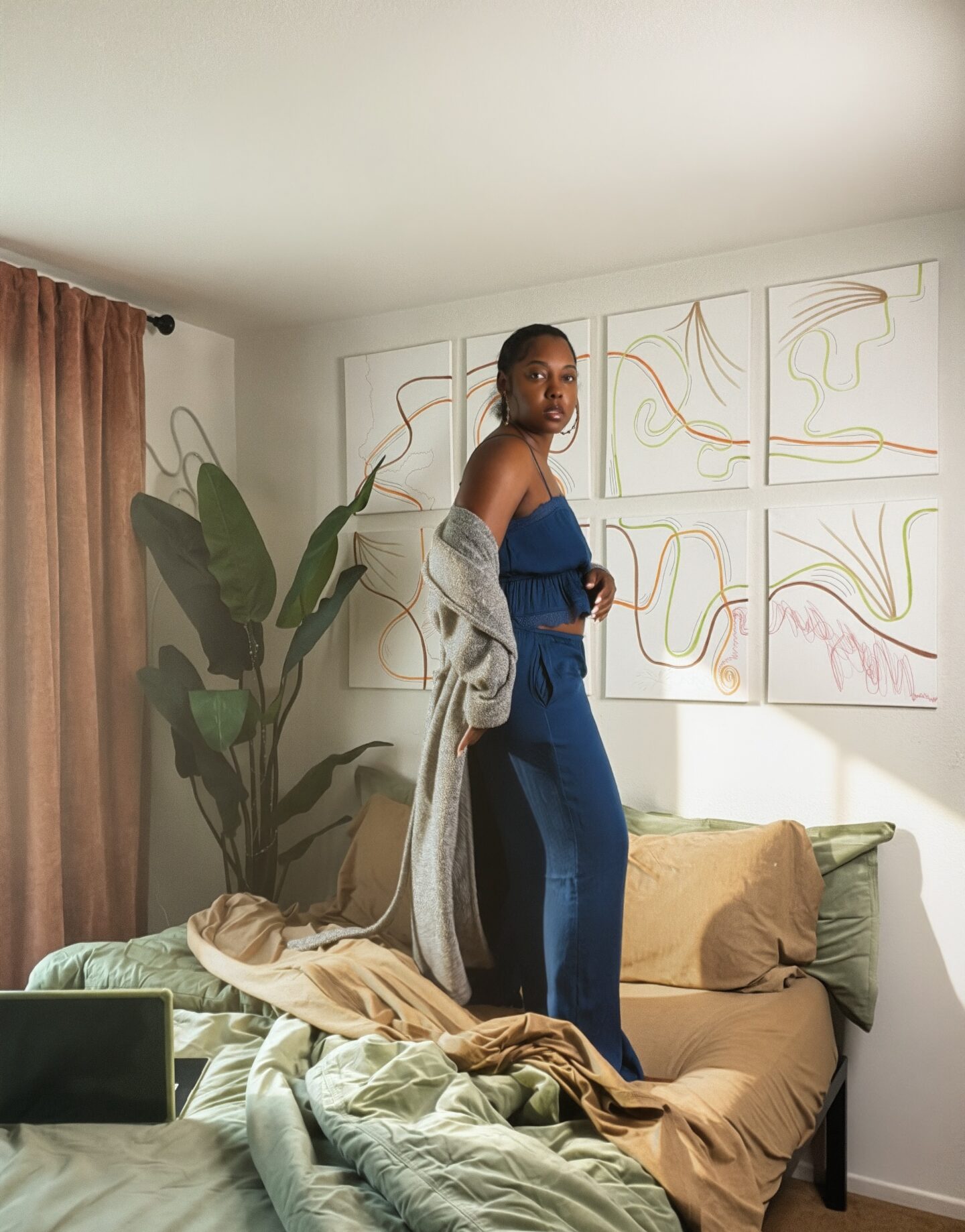 earth tone bedroom, sage green comforter, terracotta curtains, LA bedroom edit