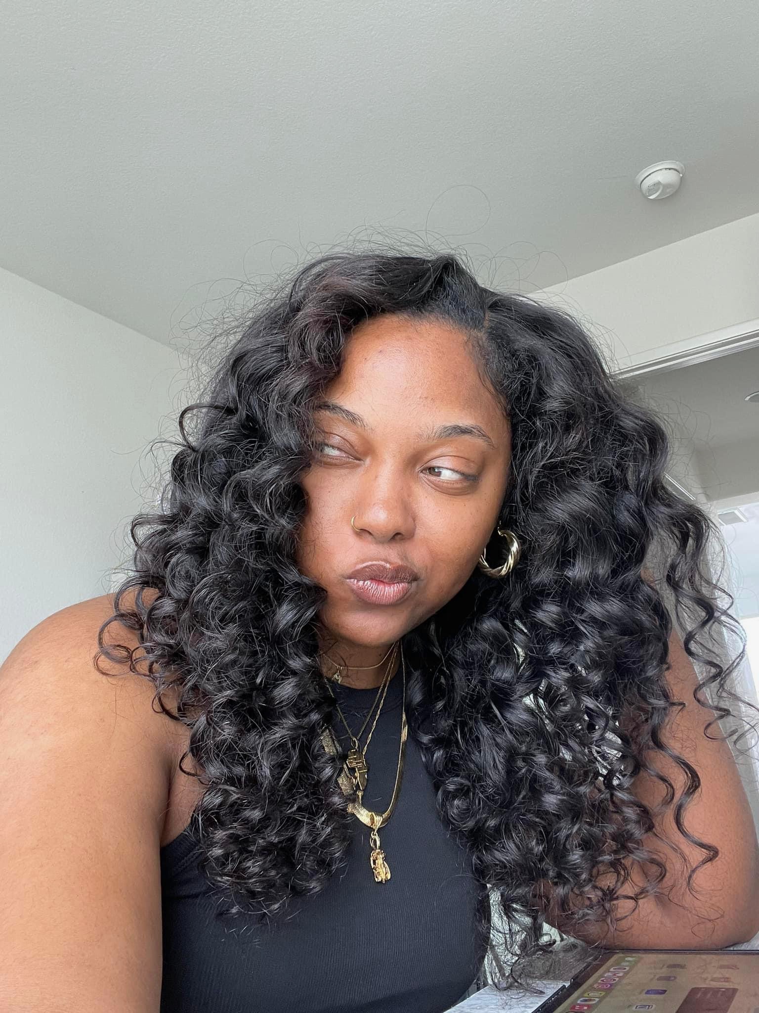 Morgan Ashley &mdash; natural skin, no makeup, curly hair, gold jewelry &mdash; skincare for melanin-rich skin at 40